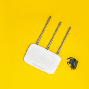 Wi-Fi router on yellow background. Credit: Aditya Singh / Pexels