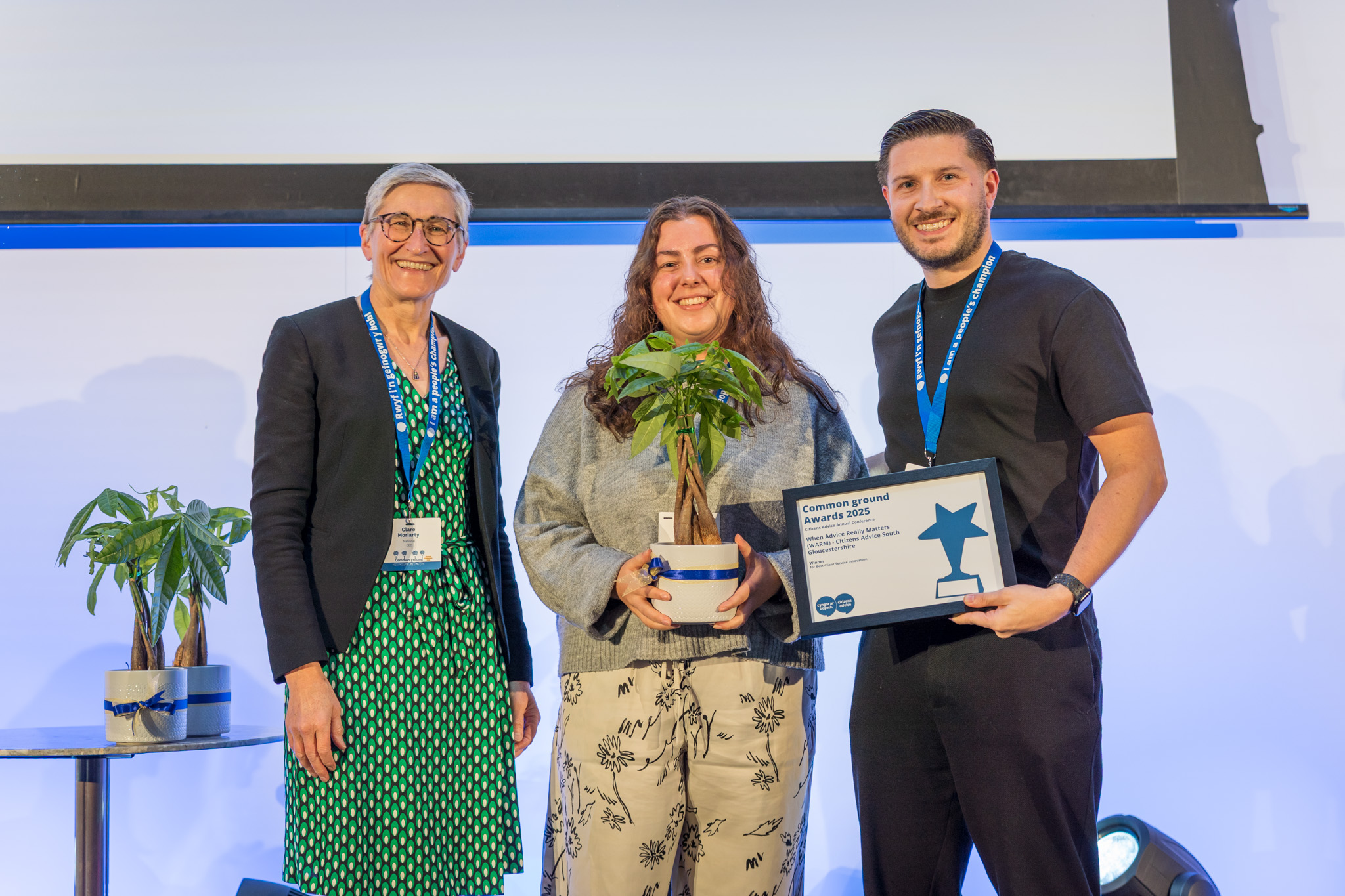 Citizens Advice CEO Dame Clare Moriarty,WARM Adviser India Ellis and Citizens Advice Sandwell & Walsall CEO Matt Lorimer, who presented the award