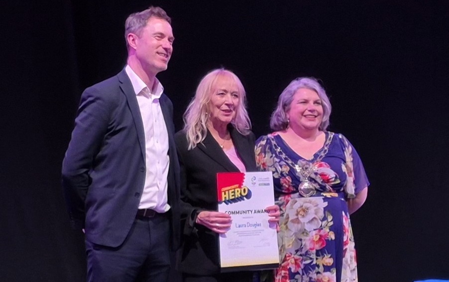 Our Adviser Laura receiving her award. From L-R: South Gloucestershire and Stroud College Principal David Withey; Citizens Advice South Gloucestershire Volunteer Generalist Adviser Laura Douglas; and South Gloucestershire Council Chair Cllr Katie Cooper.