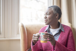 Neutral woman with drink