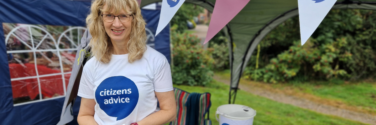 Smiling volunteer at charity event