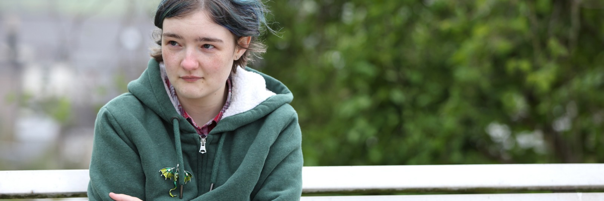 Serious woman on bench